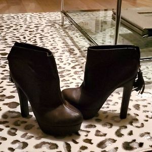 Colin Stuart hight heeled brown boots